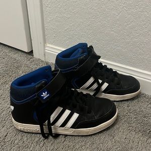 Adidas high top shoes. Worn but pretty good shape. Very unisex